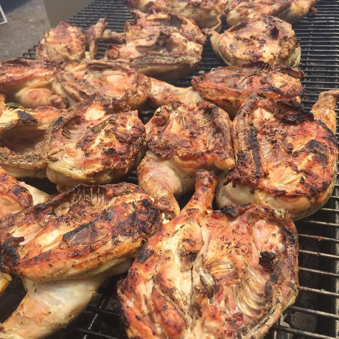 Grilled chicken prepared at The Mansard's Orchard Park kitchen for a drop-off catering order